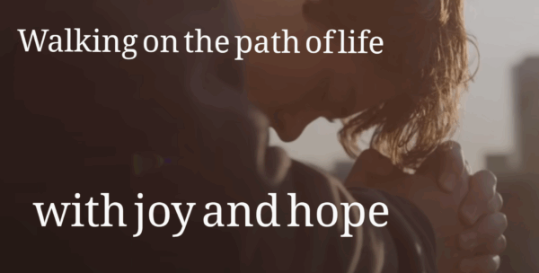 Walking on the path of life with joy and hope Image